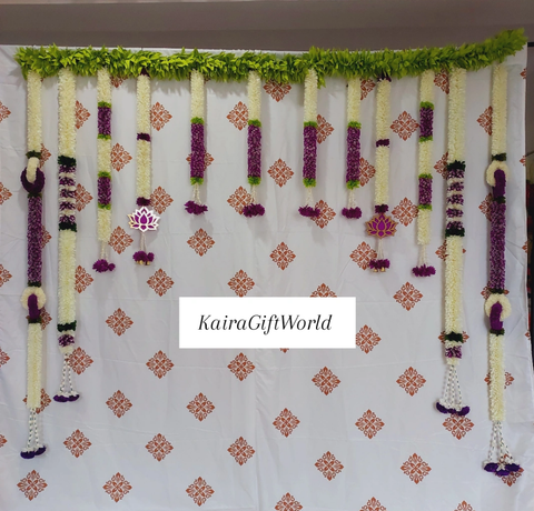 Gold backdrop with Purple Garlands!!!