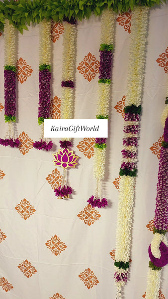 Gold backdrop with Purple Garlands!!!